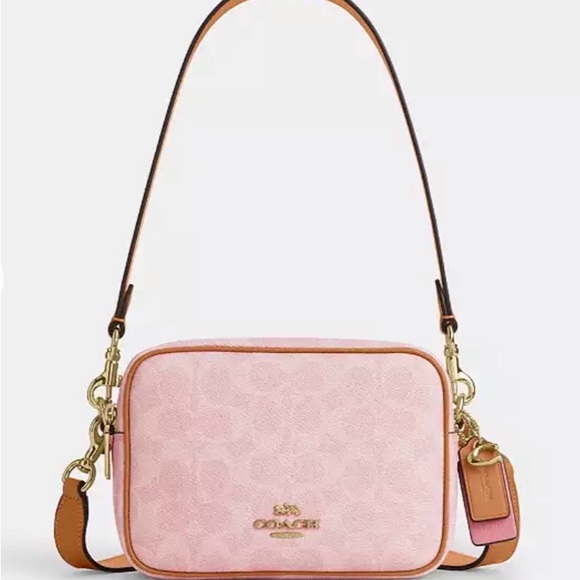 Coach Handbags - NWT Coach Mini Carey Crossbody Bag
In Signature Canvas With Charms CEK74